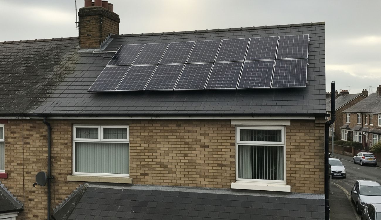 Rooftop solar panel installation on a brick residential home in the North East of England